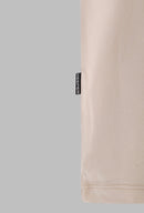 CAMISETA UNDEFINED BEIGE. Oversize