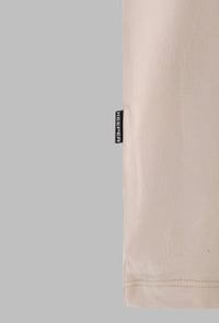 CAMISETA UNDEFINED BEIGE. Oversize